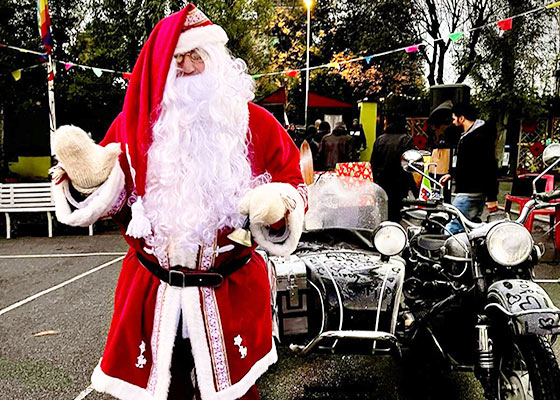 Babbo Natale in sidecar per le vie di Roma